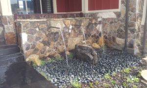 Utah landscaping with a wall water feature in the Salt lake city Parade of Homes